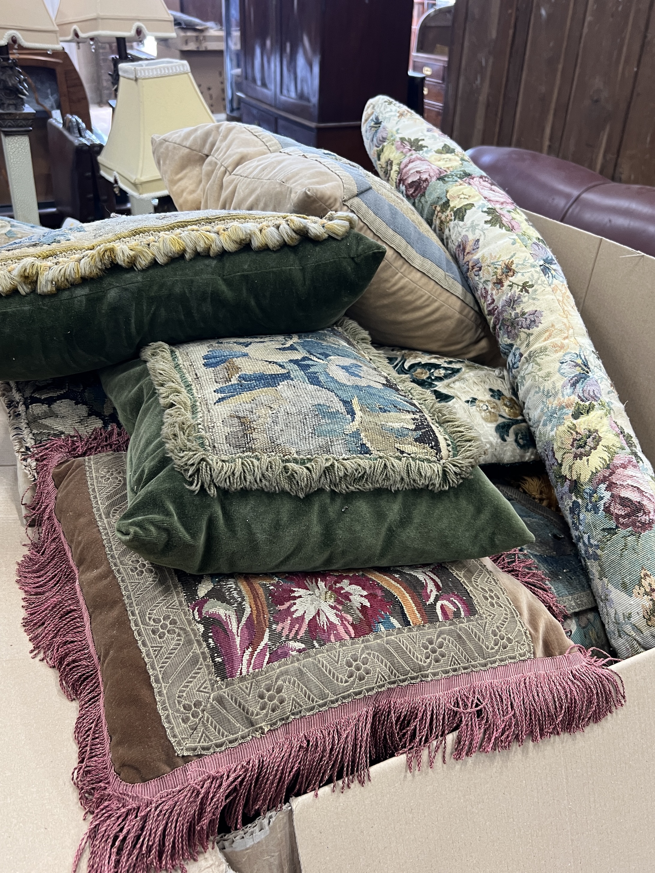 Nine assorted tapestry cushions and a tapestry hanging fragment